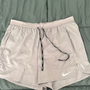Nike men's Gray Shorts 5”
Worn a couple times
100% authentic